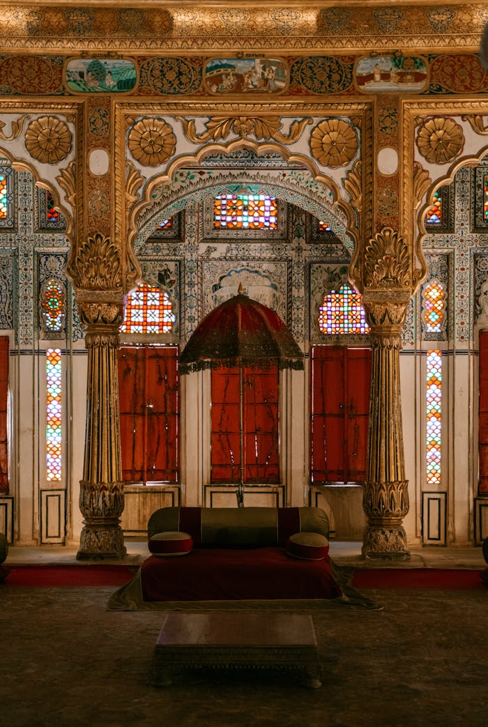 Captivating ornate interior of an Indian palace showcasing traditional and luxurious decor.